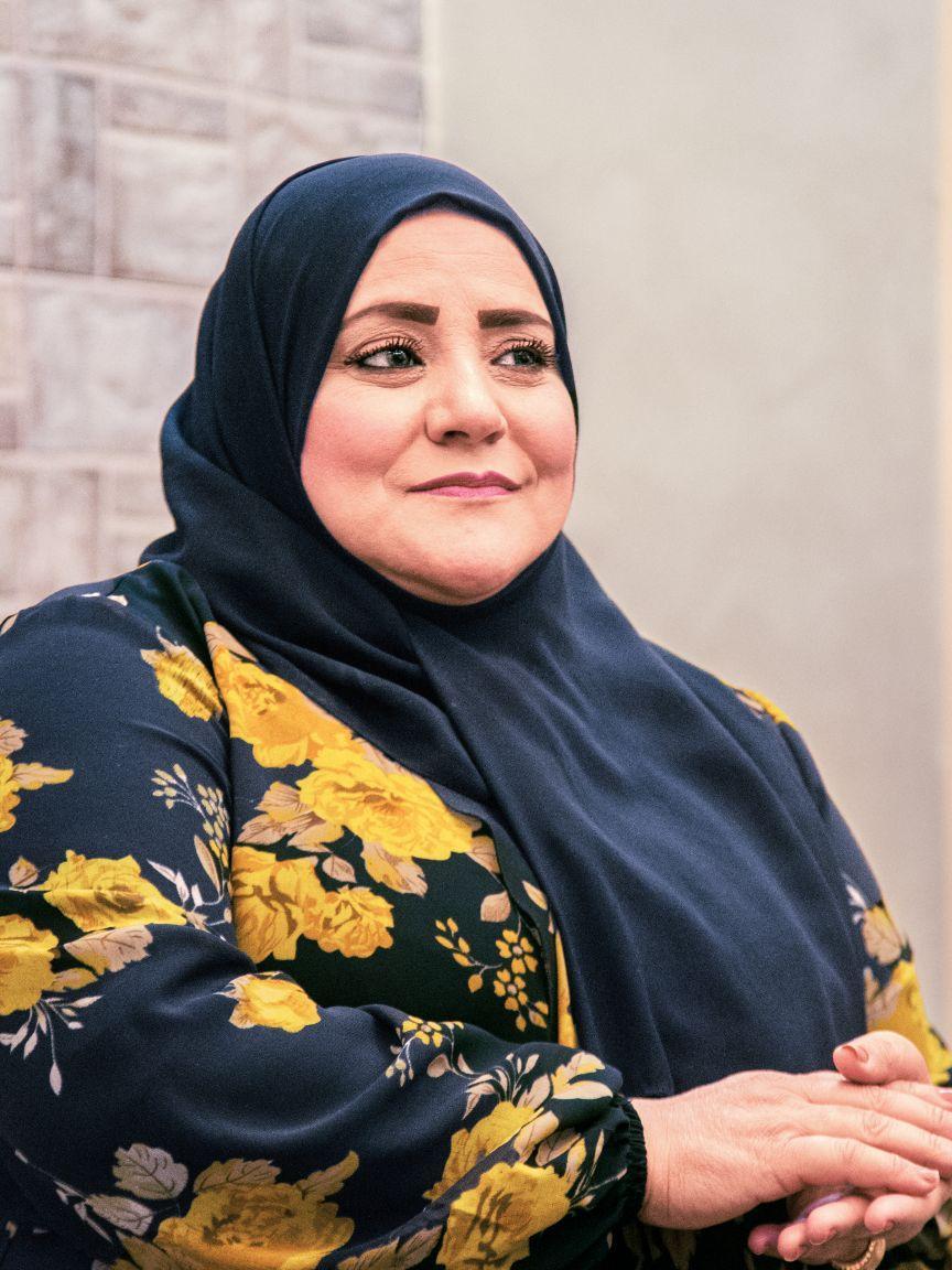 Woman wearing a headscarf in an interview situation