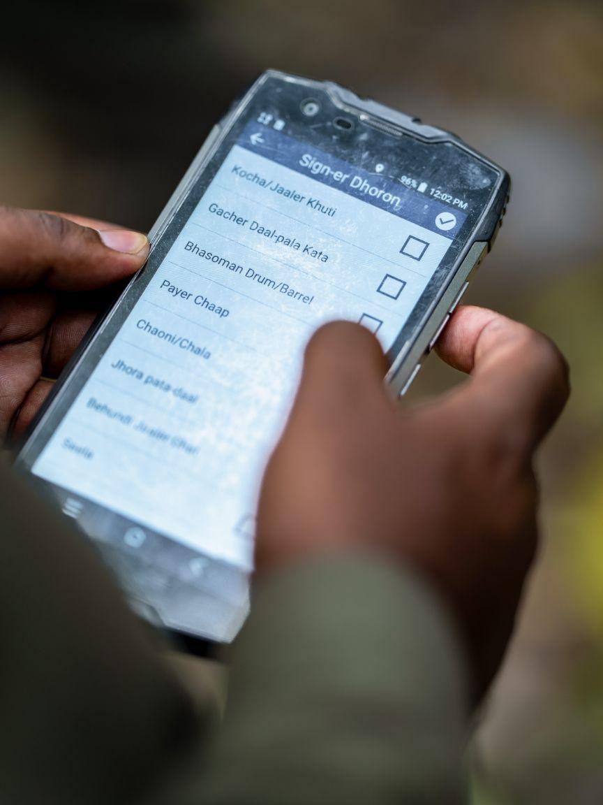 Smartphone with the “SMART” app for logging