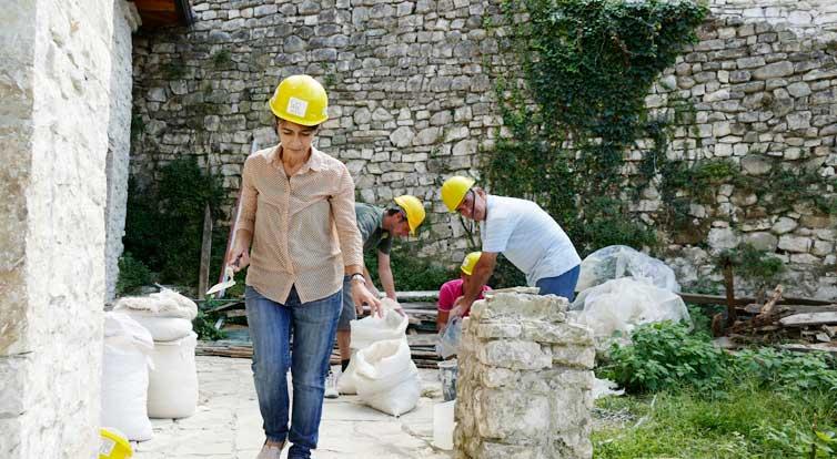 Majlinda Çuka on the building site in Berat with her colleagues.