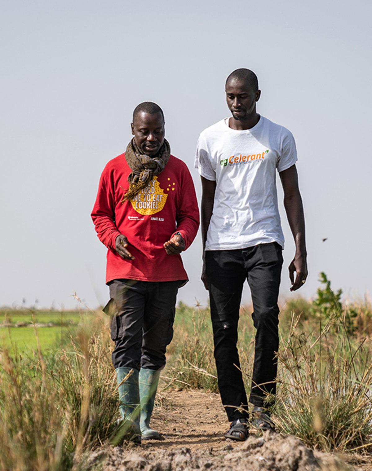 Two men on a dirt road