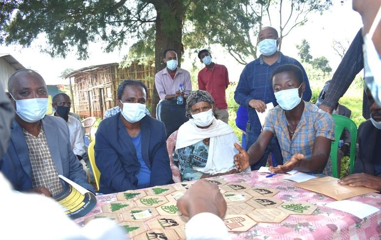 Community representatives and experts participate in a serious game developed