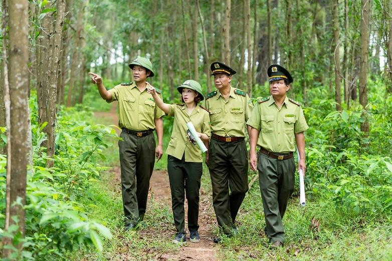 Four rangers on their regular forest patrol.