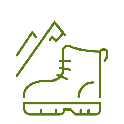 Green icon of a hiking boot with stylized mountains in the background.