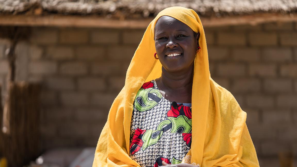 A woman in colourful clothing