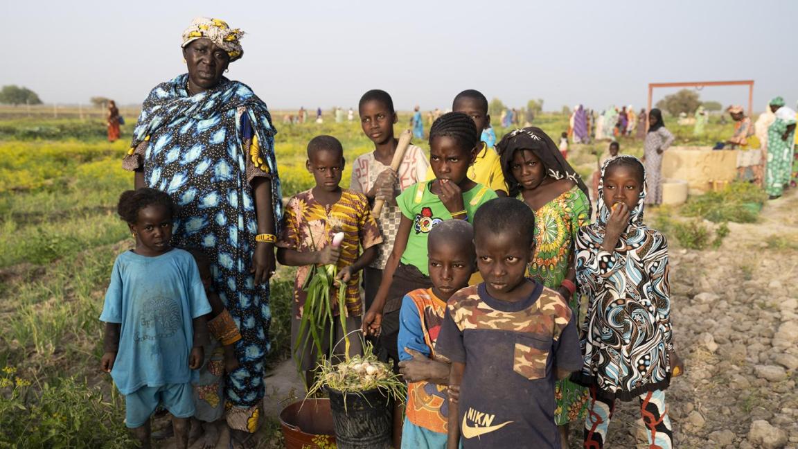 Farmer with a group of children