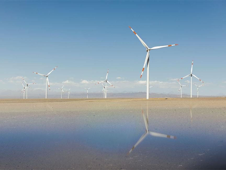 A wind farm with numerous wind turbines in the Atacama Desert in Chile.