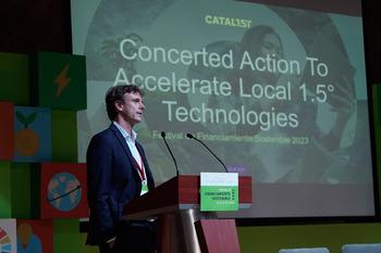 A man standing at a lectern at the launch event of the CATALI.5°T initiative, as part of the Sustainable Financing Festival in Mexico.