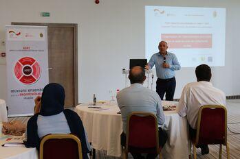 Des représentant·e·s des communes partenaires et du ministère des Affaires Locales discutent de la restructuration des communes, automne 2021.