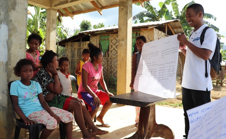 Group of indigenous people meet for planning.