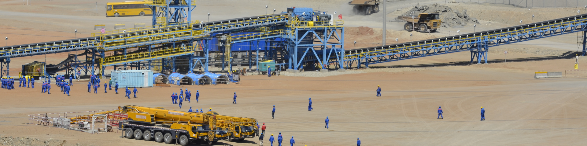 People work in a large copper mine.