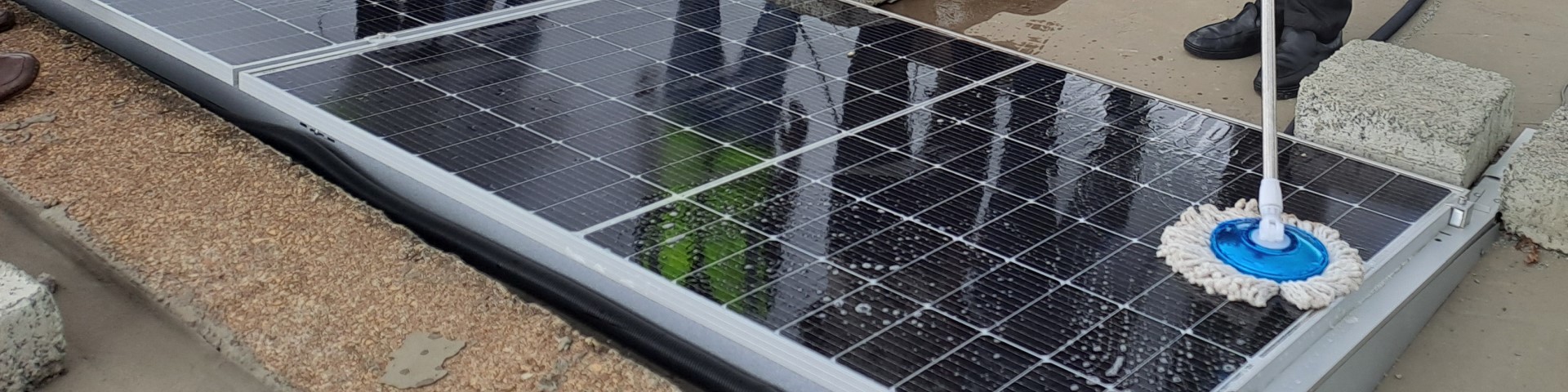 A solar panel being cleaned.