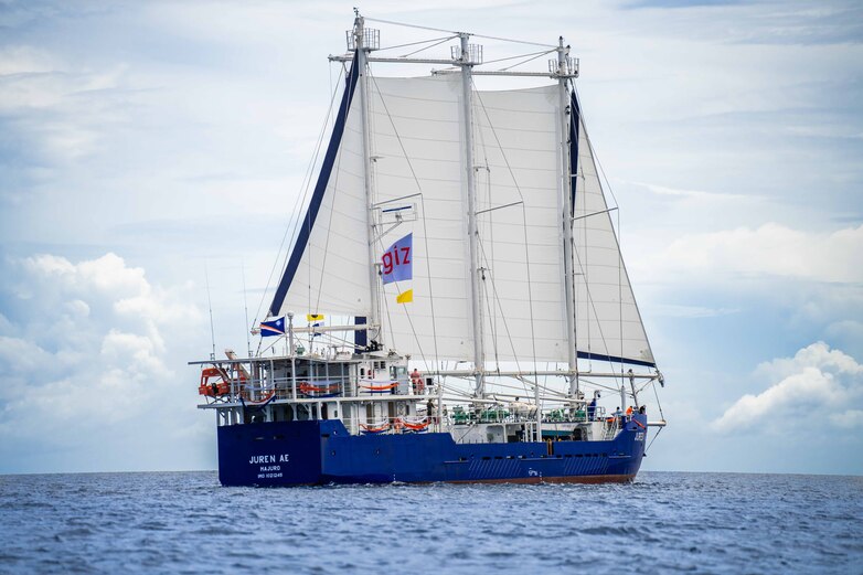 Sailing ship Juren Ae out in the lagoon