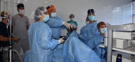 People working in an operating room.