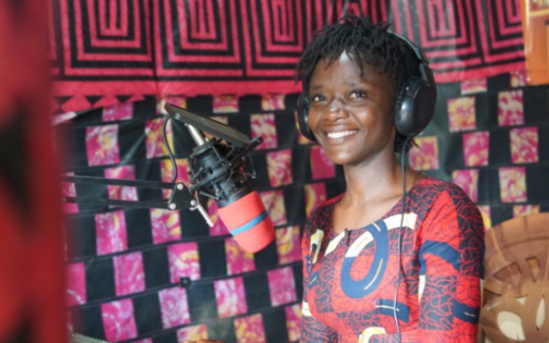 Journalist Salome Mugaza presenting the news at Kalehe Territorial Community Radio’s studio.