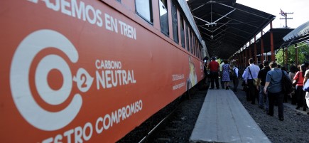 People board a climate-neutral train.